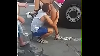 A Guy Gives Oral Pleasure To A Woman'S Private Area In Public